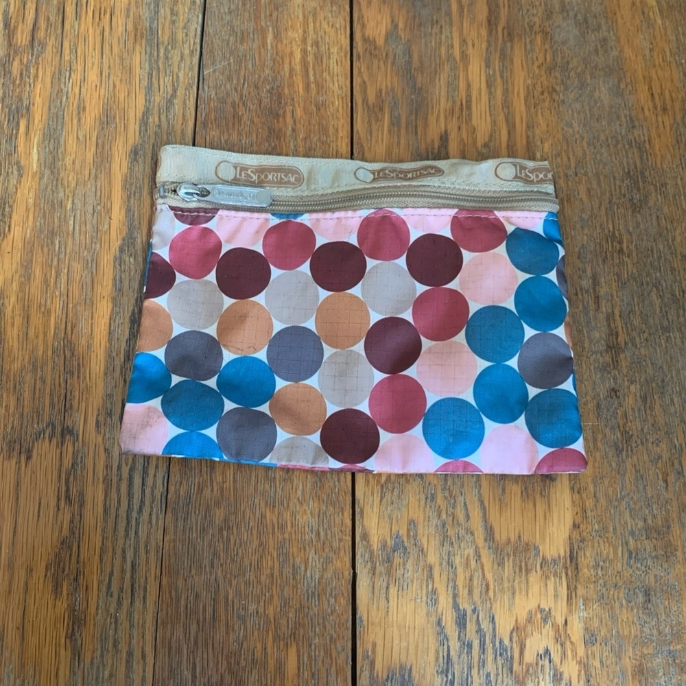 LeSportsac Travel Makeup Bag with mulit-color polka dots.